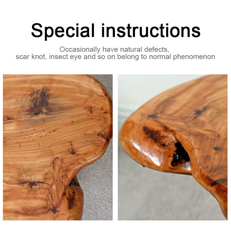 Handmade natural edge solid wood table by Blak Hom, warm wood tones with visible grain and natural imperfections.