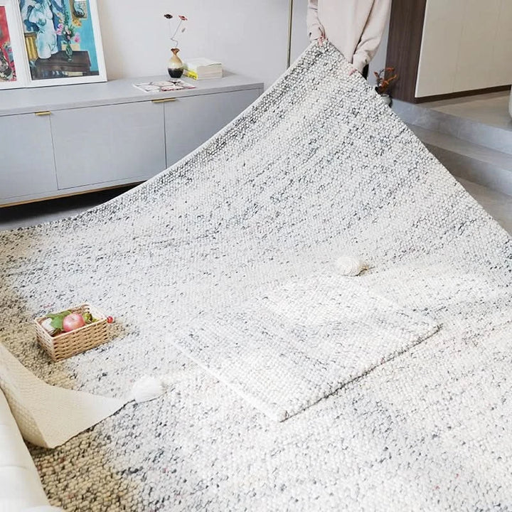 Luxurious Wool Rug in modern neutral design, a cozy addition to any living room.