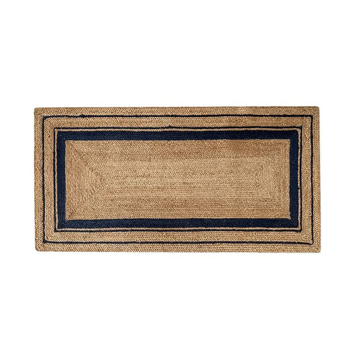 Natural jute rug with navy stripes, braided texture, rectangular home decor accent.