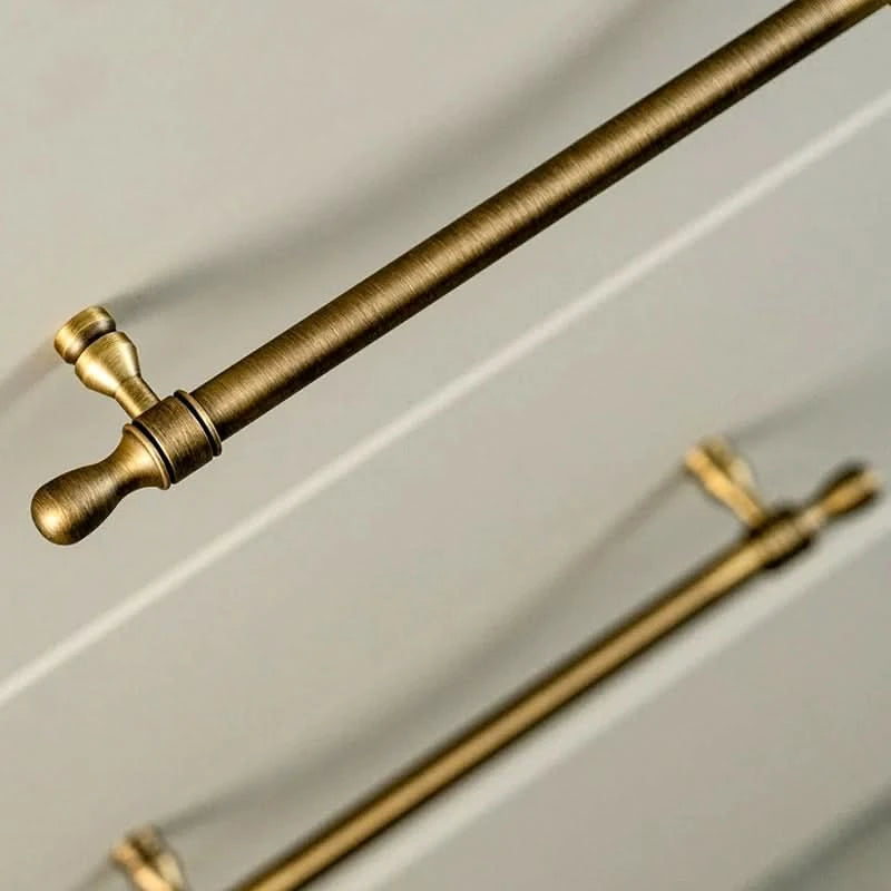 Antique brass Modern Extended Cabinet Handles on white drawers, customizable lengths.