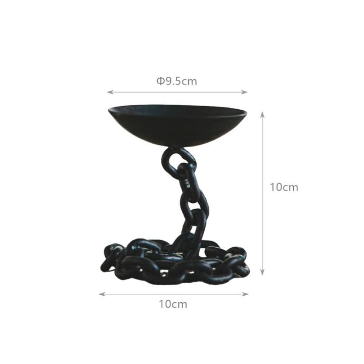 Black chain candle holder, industrial home decor accent with metal chain base.