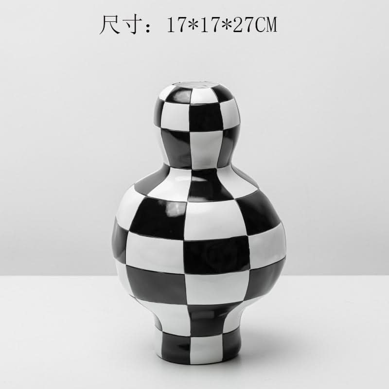 Black and white checkered ceramic vase, a modern home decor statement piece.