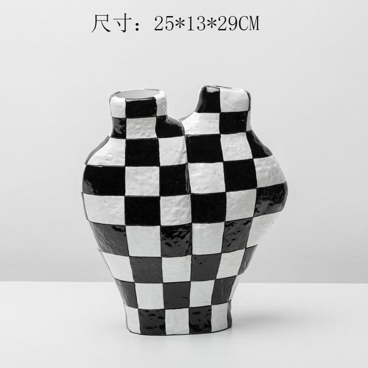 Black and white checkered vase, textured ceramic home decor.