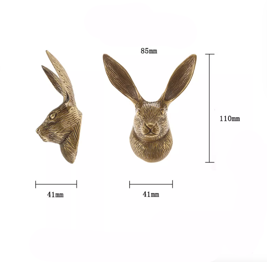 Antique brass hare wall hook with detailed textured finish. Home decor.