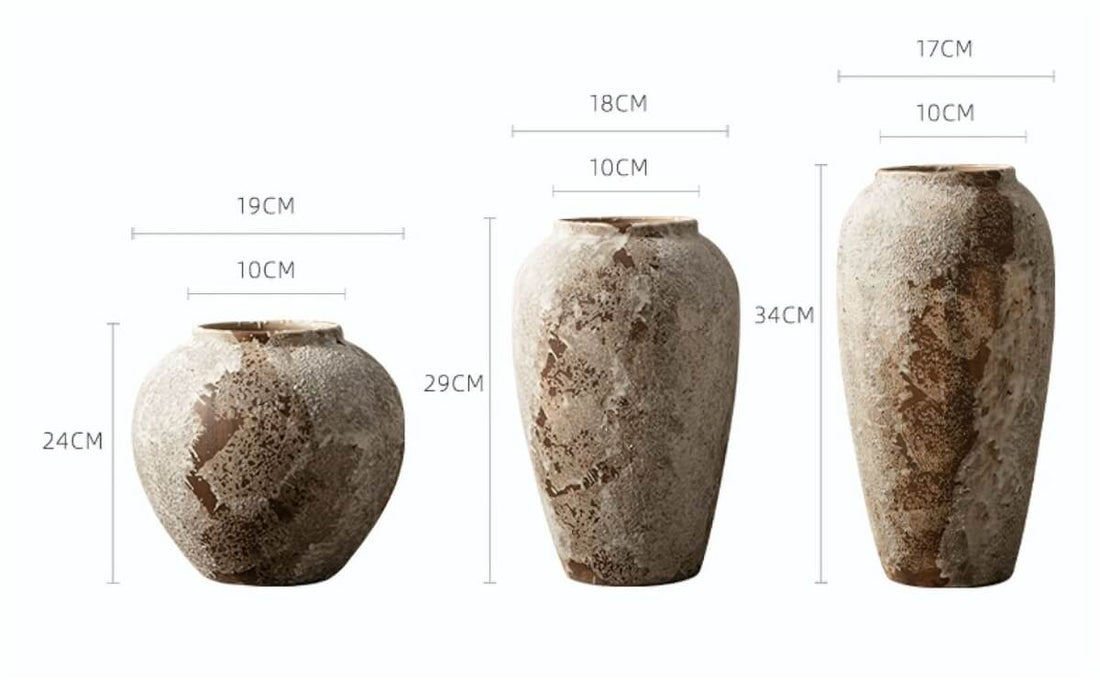 Antique effect ceramic vases in earthy tones with textured stoneware finish.