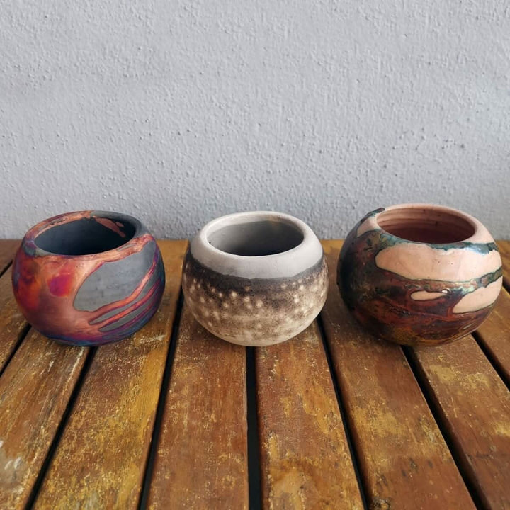 RAAQUU Tsuchi Ceramic Raku Pottery Planter Pot Mixed Finish Set of 3, three spherical rustic pots.