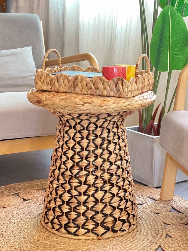Wabi Sabi Coffee Table Straw with woven basket and decorative mugs in a modern living room.