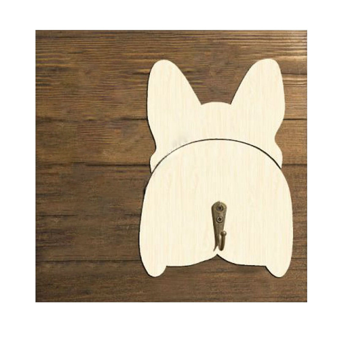 Light wood dog leash holder with brass hook on rustic wooden background.