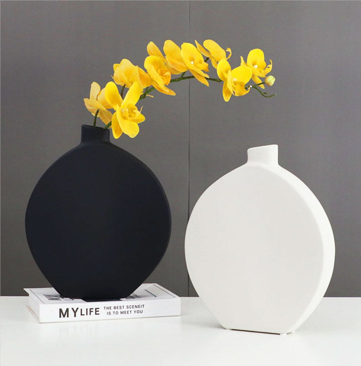 Black and White Ceramic Table Vase with yellow flowers, minimalist zen decor.