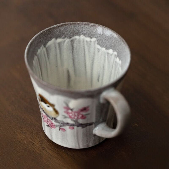 Hand-made mug with sakura tree & bird, ceramic, rustic glazed pottery from Japan.