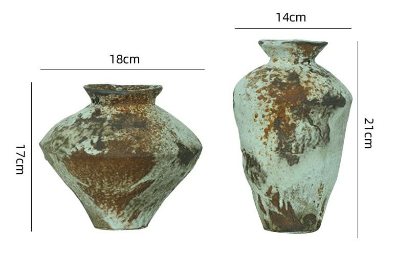 Wabi-sabi handmade ceramic vases with rugged texture, zen decor accents.