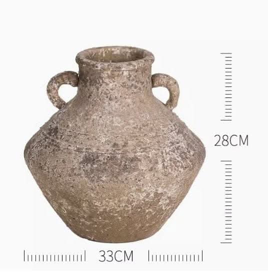 Rustic handmade rough pottery vase with handles. Perfect for succulents or dried flowers.