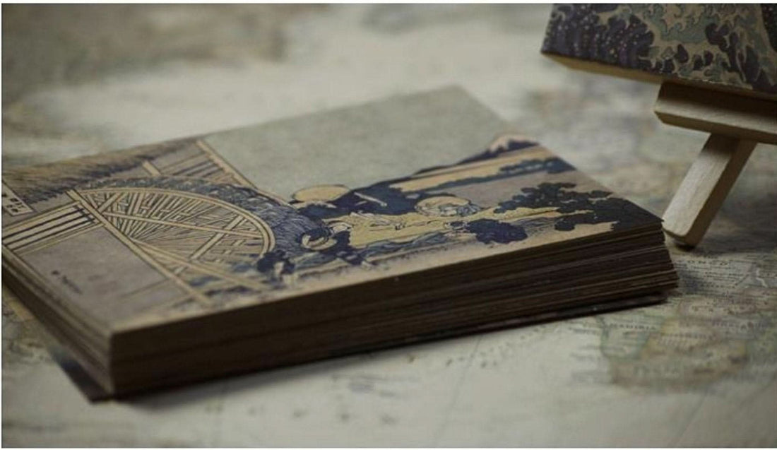 Hokusai Japanese Art Postcards feature traditional ukiyo-e prints in sepia tones on aged paper.
