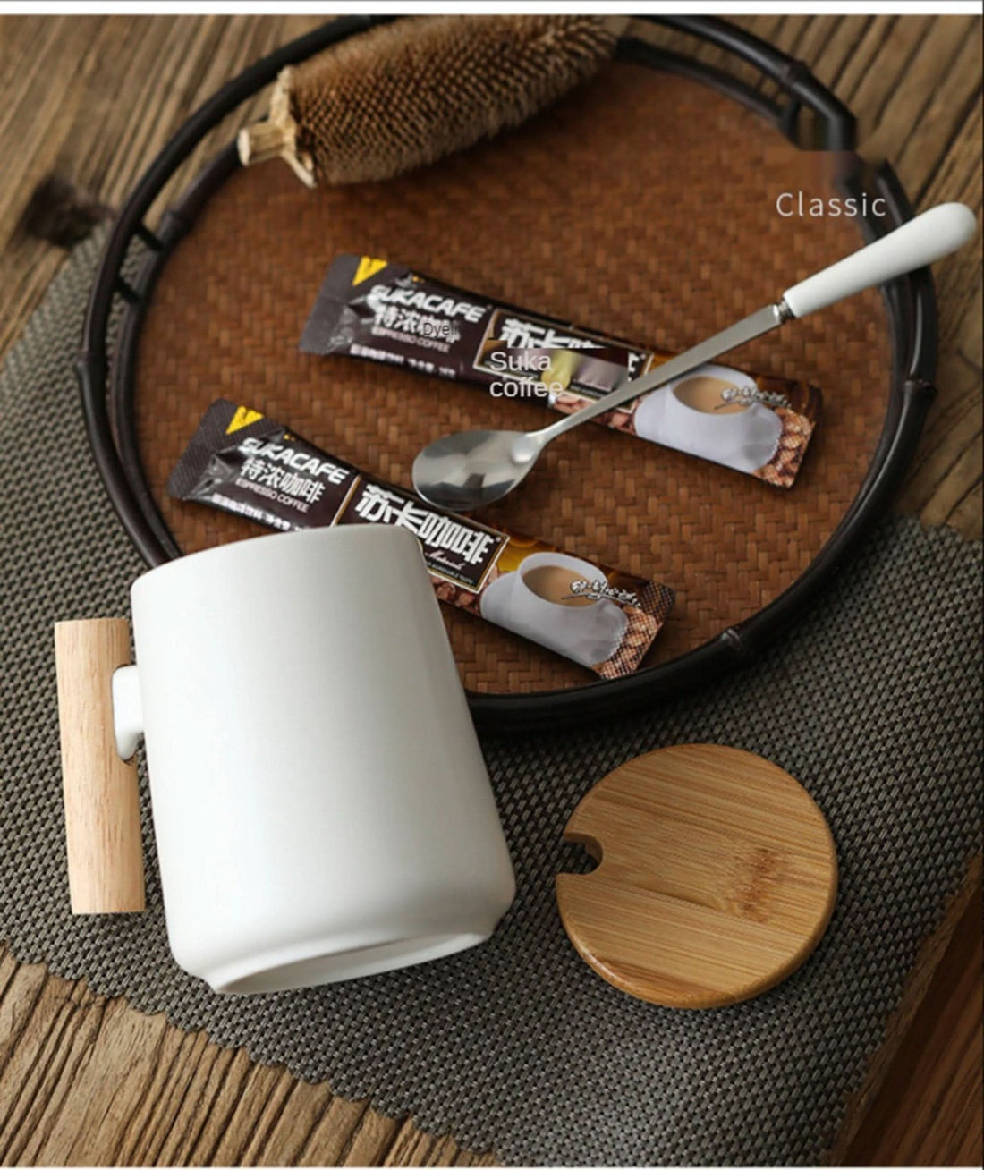 Minimal Japanese style white coffee mug with wood handle, 480ml. Includes coffee sachets.