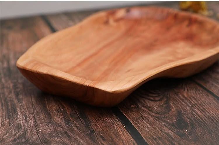 Irregular wooden plate with natural grain, perfect for farmhouse breakfast or tea settings.