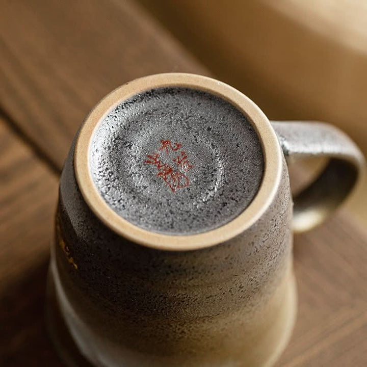 Kutani Burning Crane Mug: Japanese ceramic with red kiln stamp. Gift cup detail.