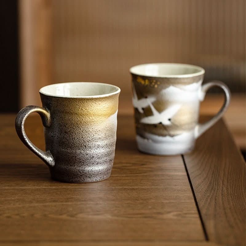 Kutani Burning Crane Mug Japanese-Style, gold & brown ceramic cups with crane design.