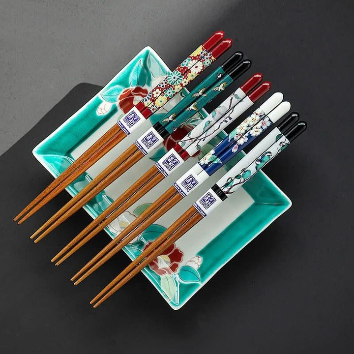 Japan Imported Kutani-Yaki Natural Wooden Chopsticks with floral & bird designs on a decorative tray.