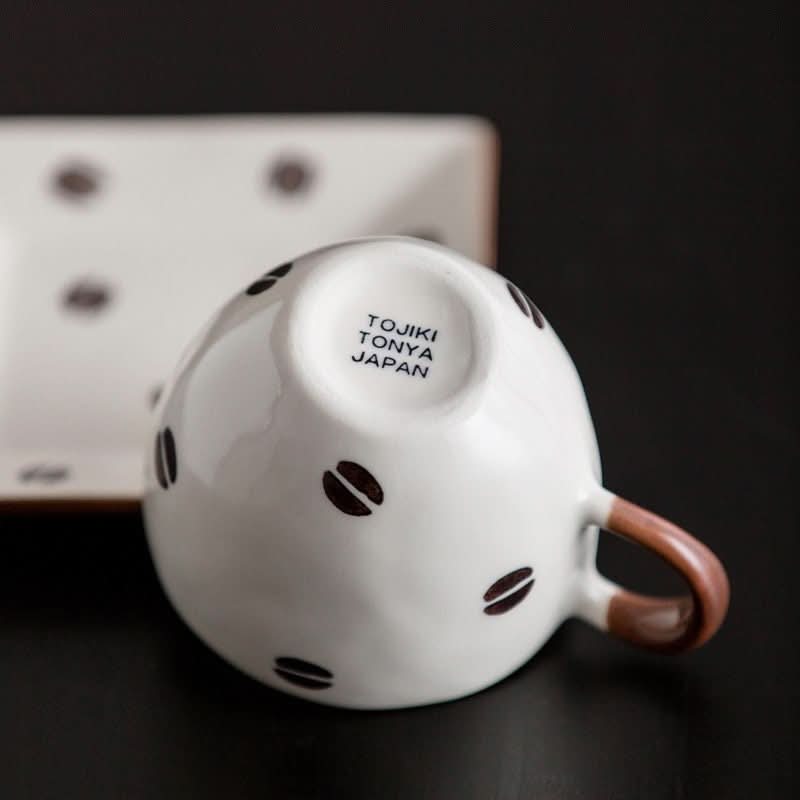 Japan Imported Mino Burn Ceramic Coffee Cup 8.45oz, white with brown coffee bean print.