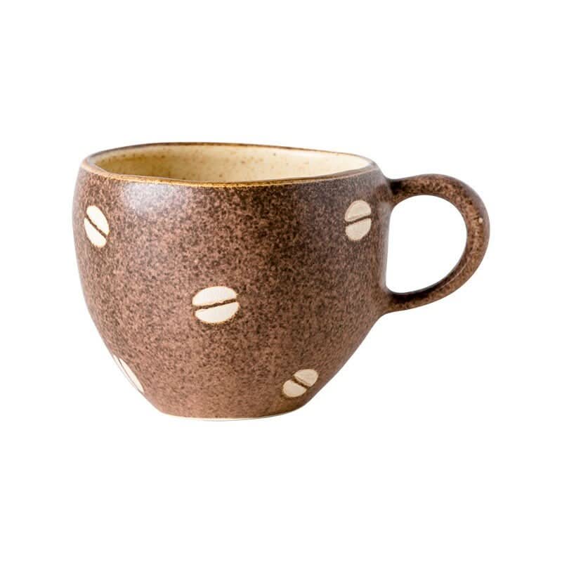 Japan Imported Mino Burn Ceramic Coffee Cup, speckled brown with white bean pattern.