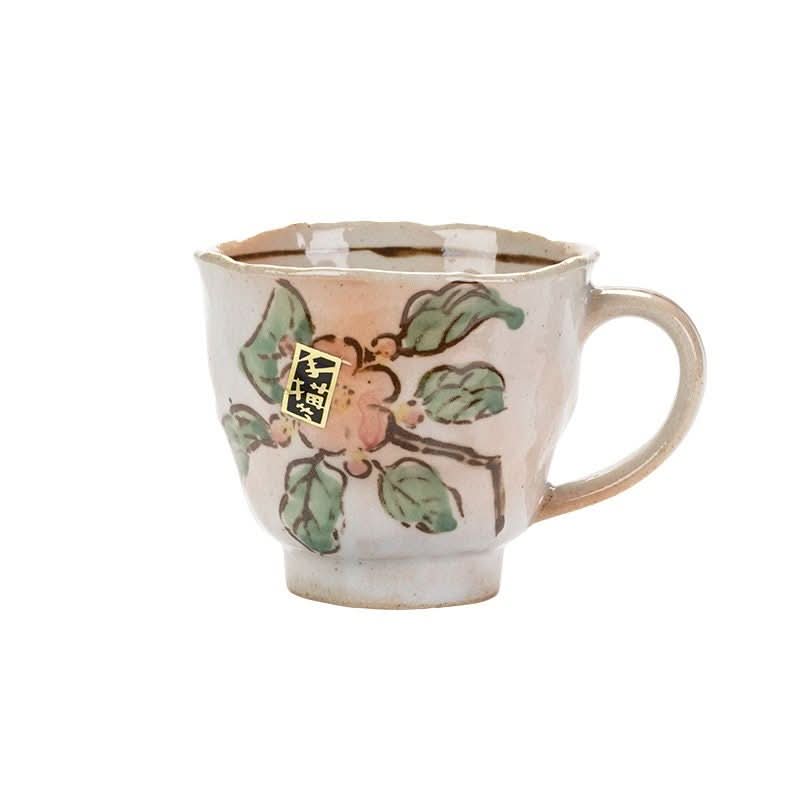 Japan Imported Mino Burning Tang Grass Cherry Blossom mug with a floral design.