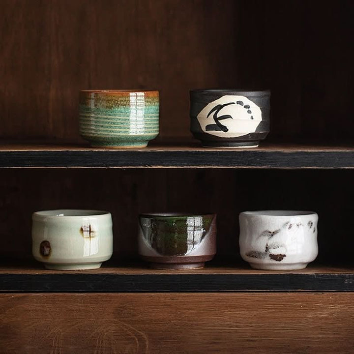 Mino-Yaki Night Breeze tea cups: rustic ceramic in green, black, and earthy tones.