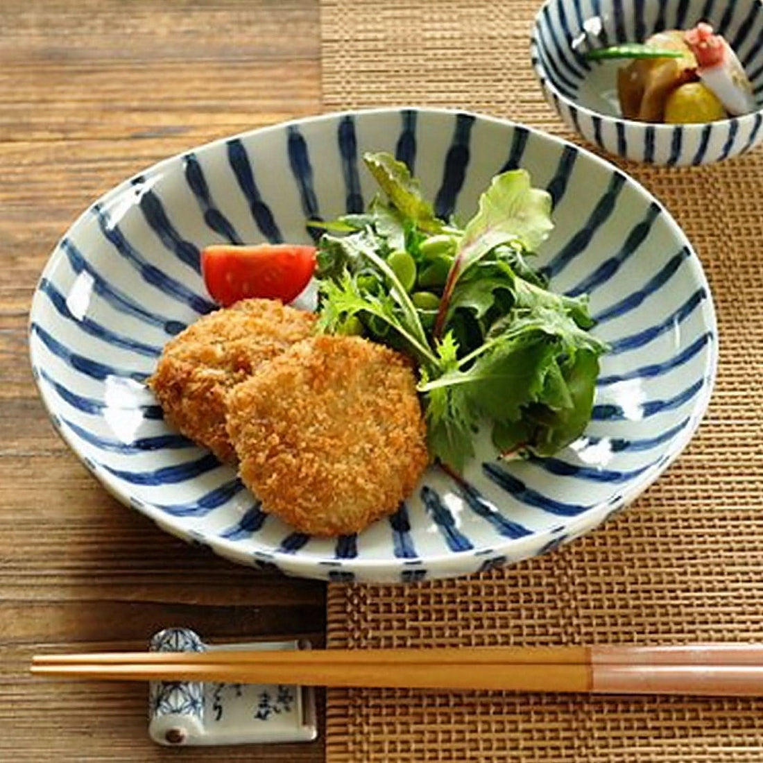 Japanese Blue and White Plates serving croquettes and salad.