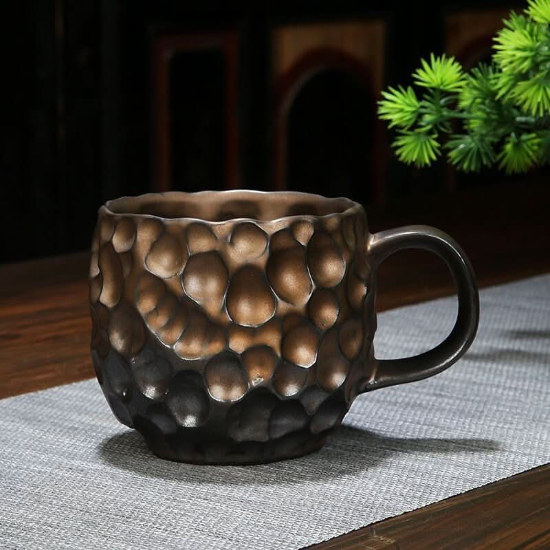 Retro Handmade Stoneware Coffee Cup with reactive glaze, earth tones.