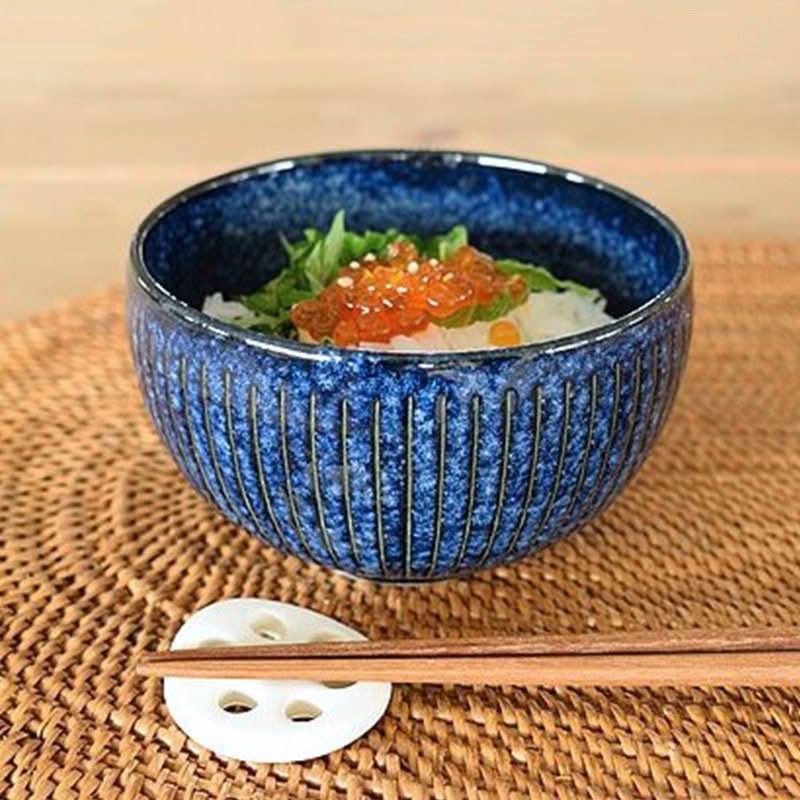 Blue stoneware soup bowl (11.16oz) with Japanese food & chopsticks on woven placemat.
