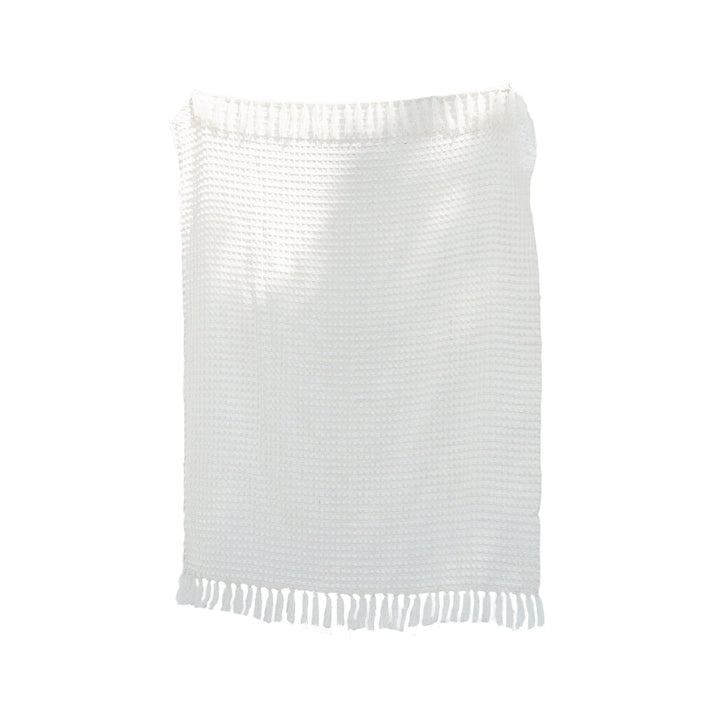 White chenille hand-loomed mud cloth blanket with fringe, perfect for sofa or bed.