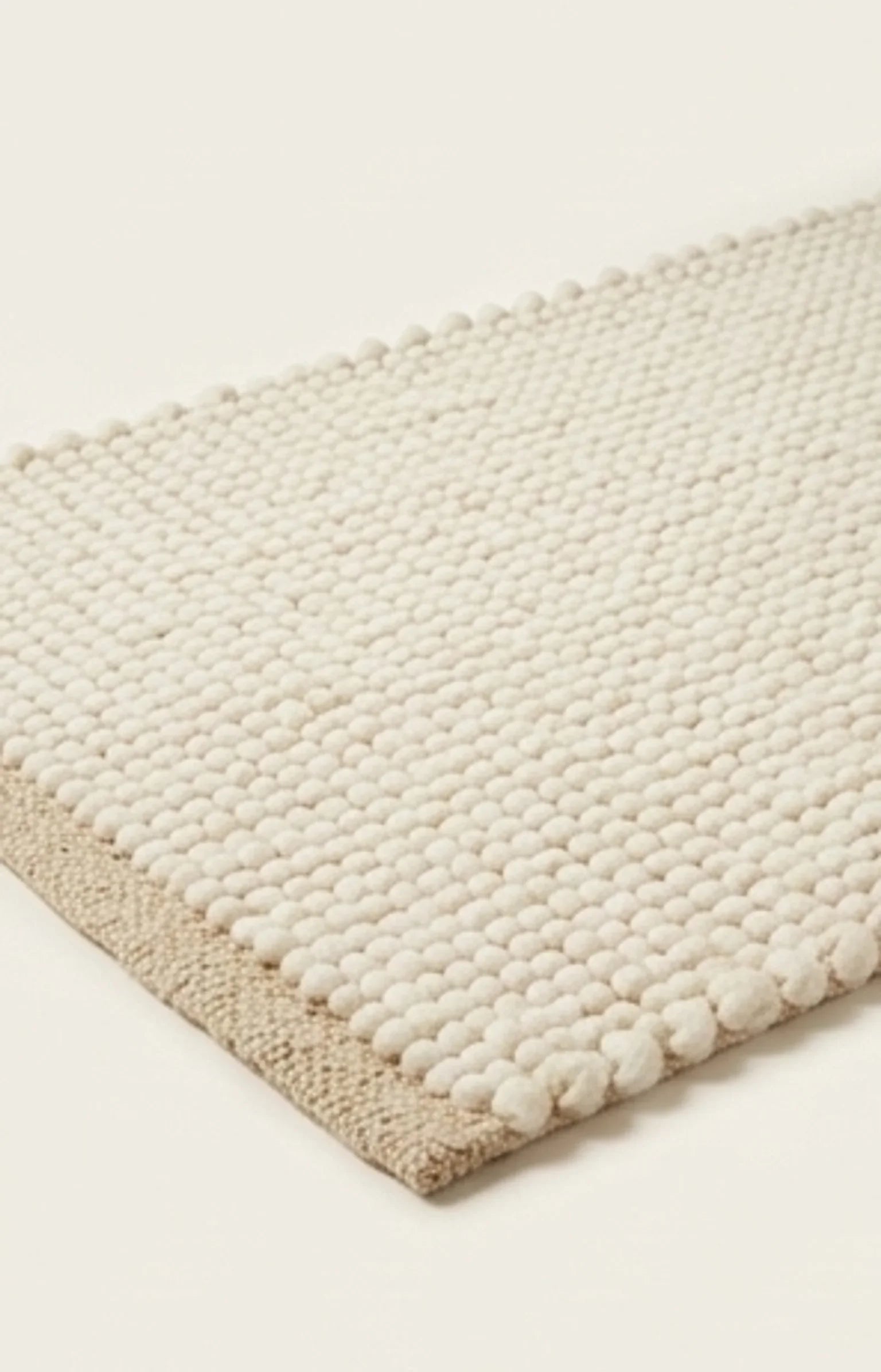 Wool Handwoven Cream Rug — studio warm-white background product shot