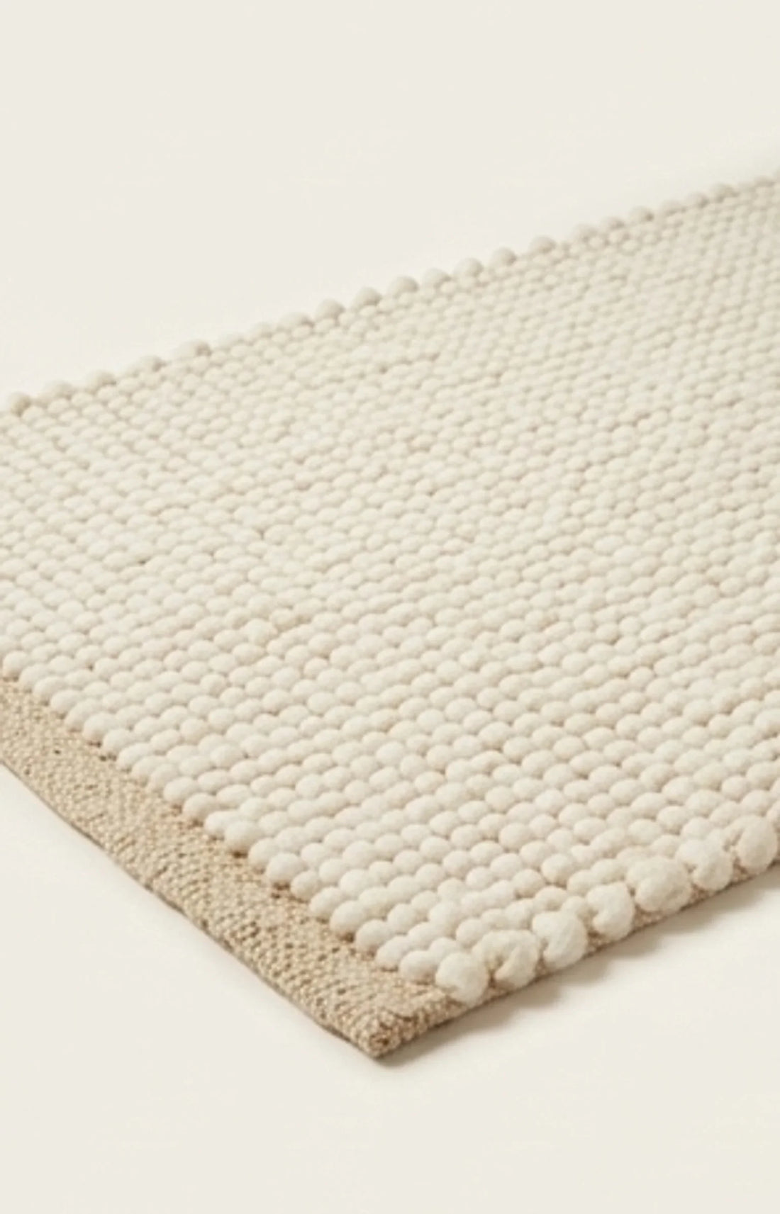 Wool Handwoven Cream Rug — studio warm-white background product shot