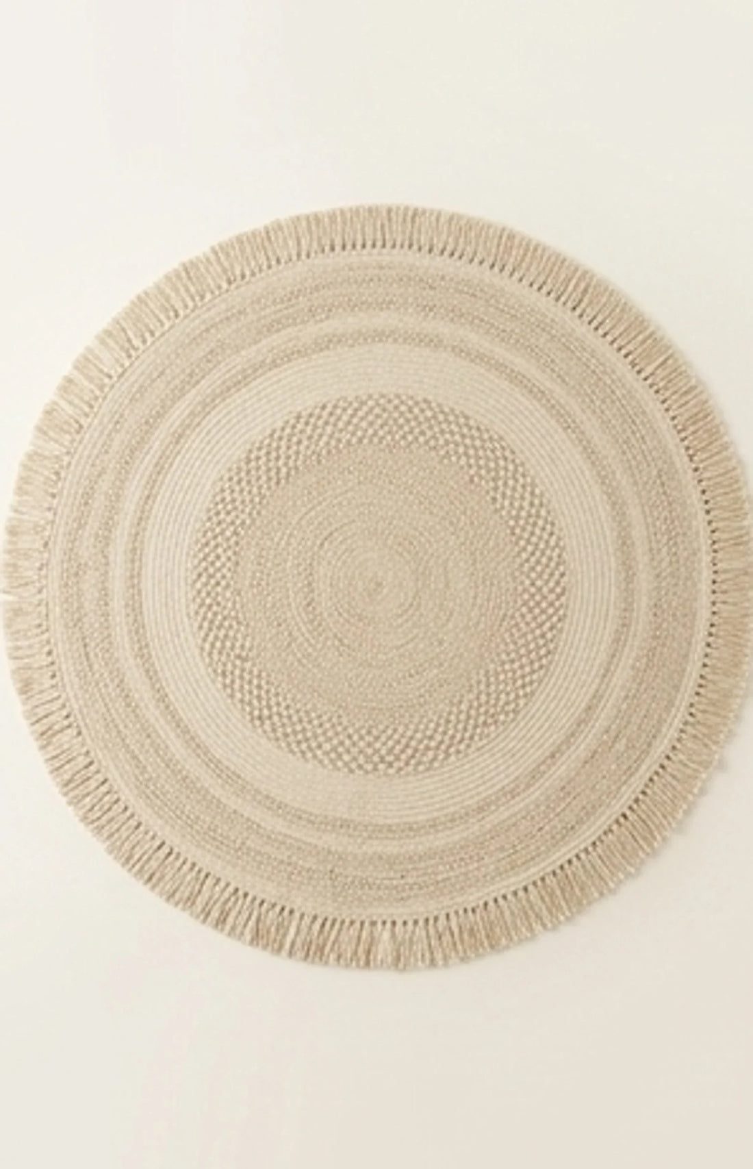 Round Wool Braided Rug — studio warm-white background product shot