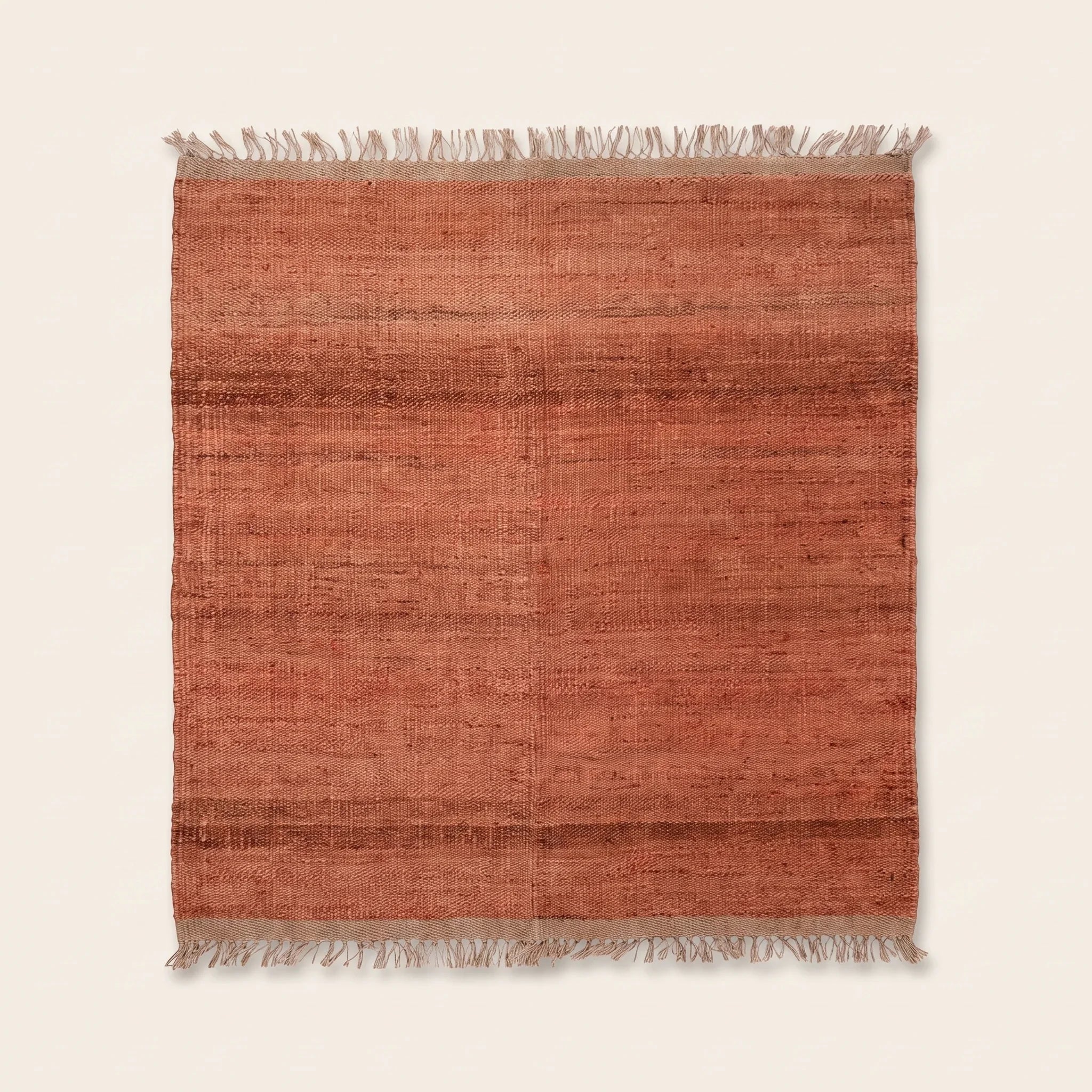 Handwoven Jute Rug - Natural & Rustic — studio warm-white background product shot