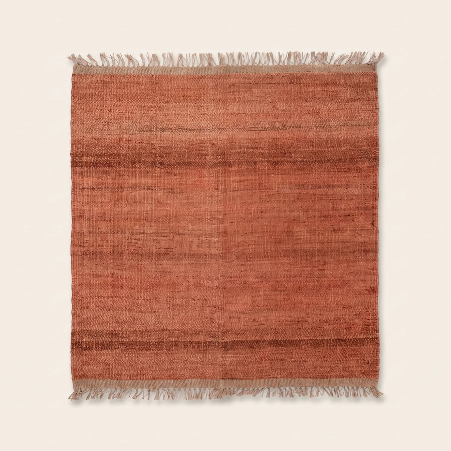 Handwoven Jute Rug - Natural & Rustic — studio warm-white background product shot