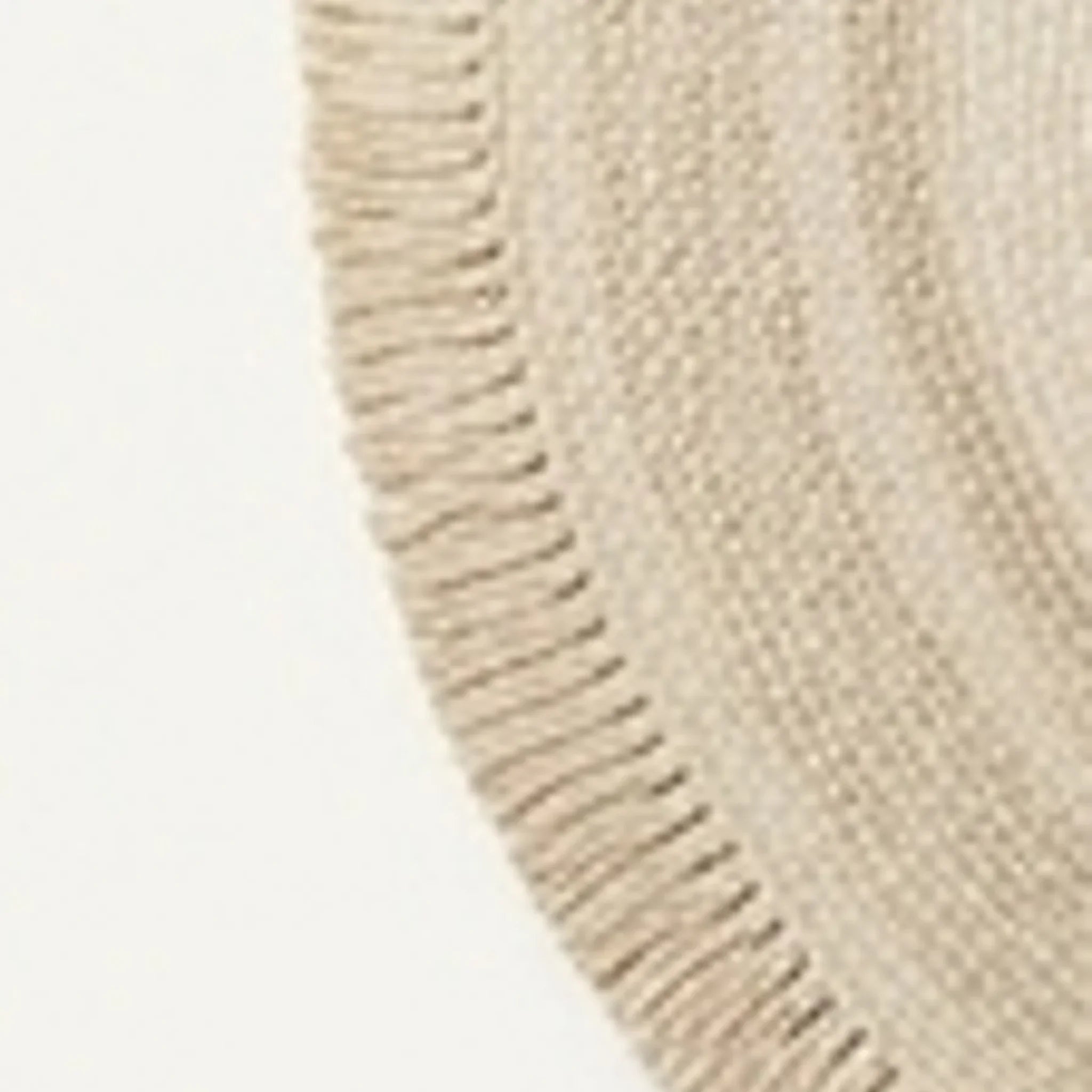 Round Wool Braided Rug — studio warm-white background product shot