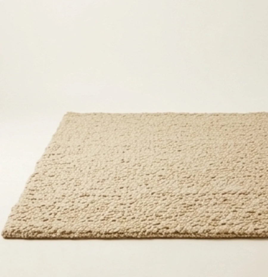 Hand-Woven Wool Shaggy Rug — studio warm-white background product shot