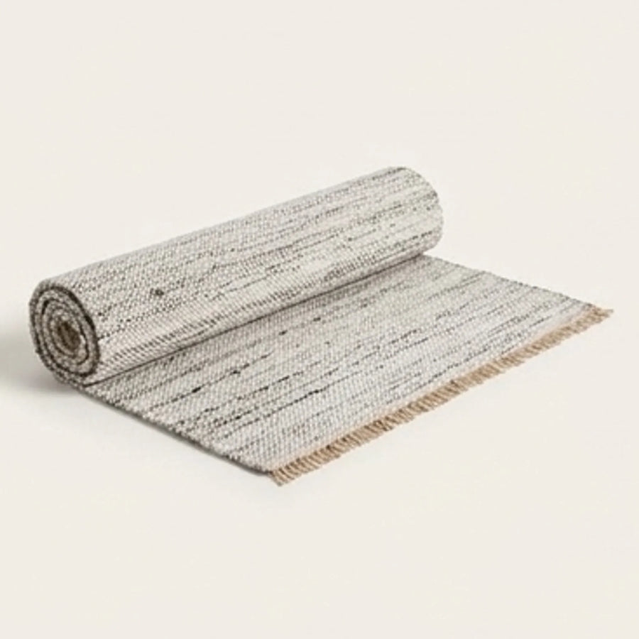 Natural Wool Carpet — studio warm-white background product shot