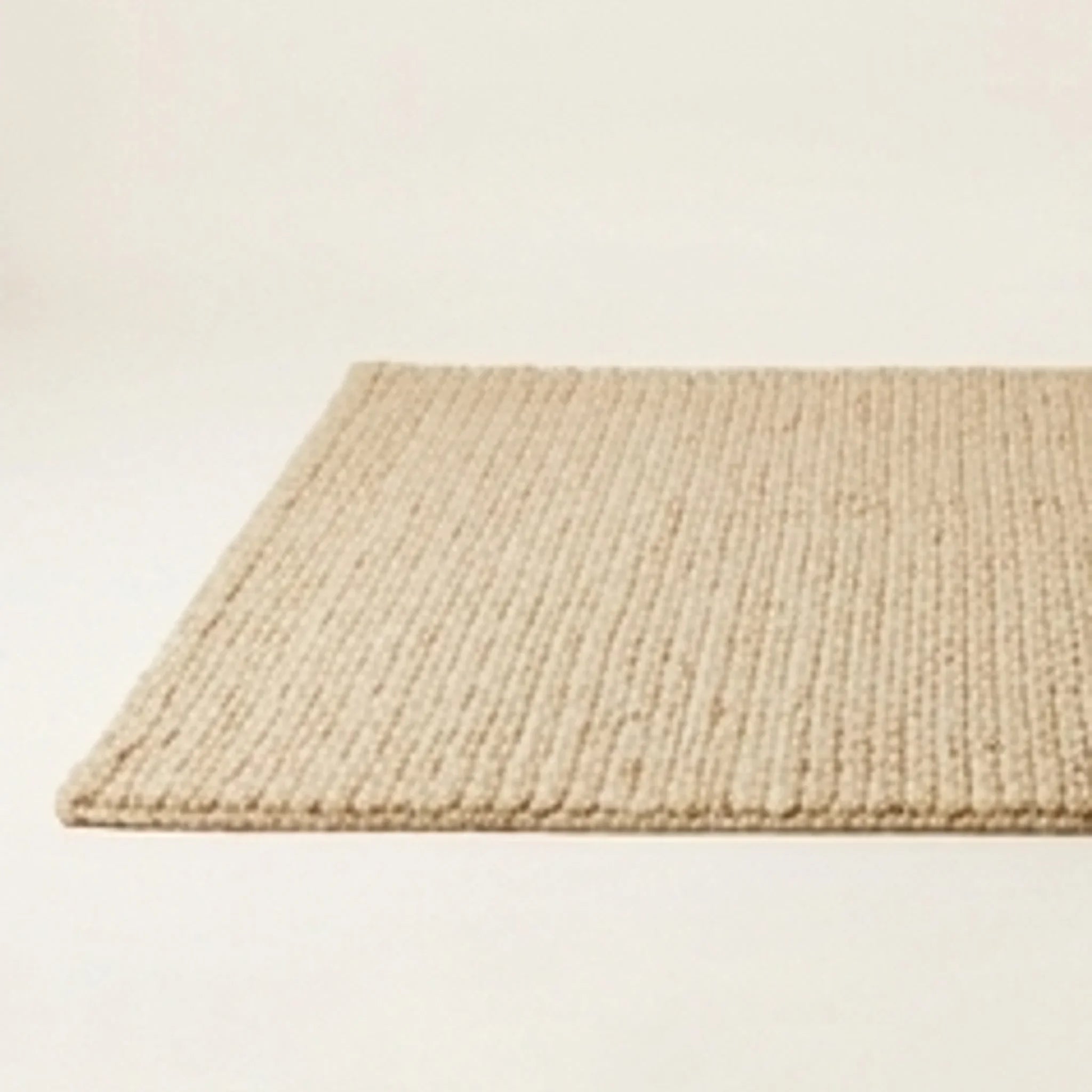 Hand-Woven Wool Shaggy Rug — studio warm-white background product shot
