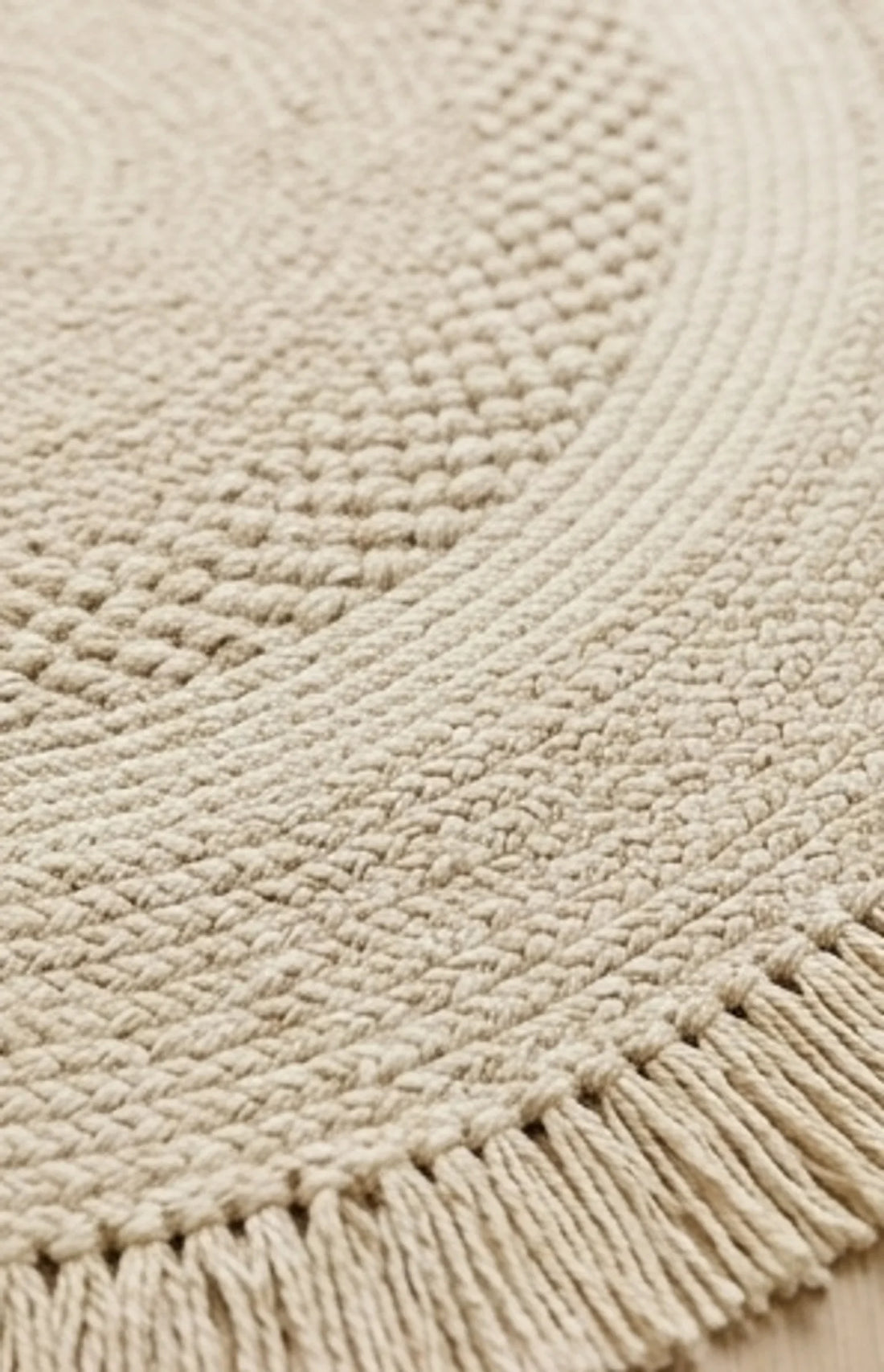 Round Wool Braided Rug — macro close-up showing material texture and finish