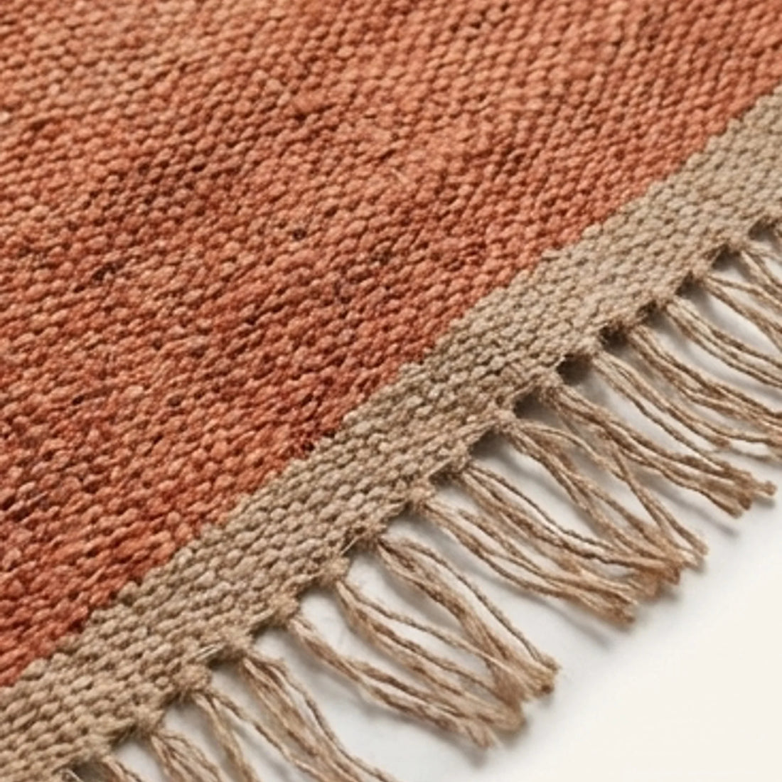 Handwoven Jute Rug - Natural & Rustic — macro close-up showing material texture and finish
