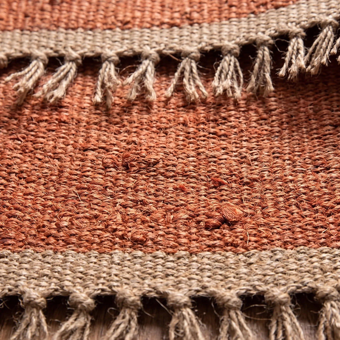 Handwoven Jute Rug - Natural & Rustic — macro close-up showing material texture and finish