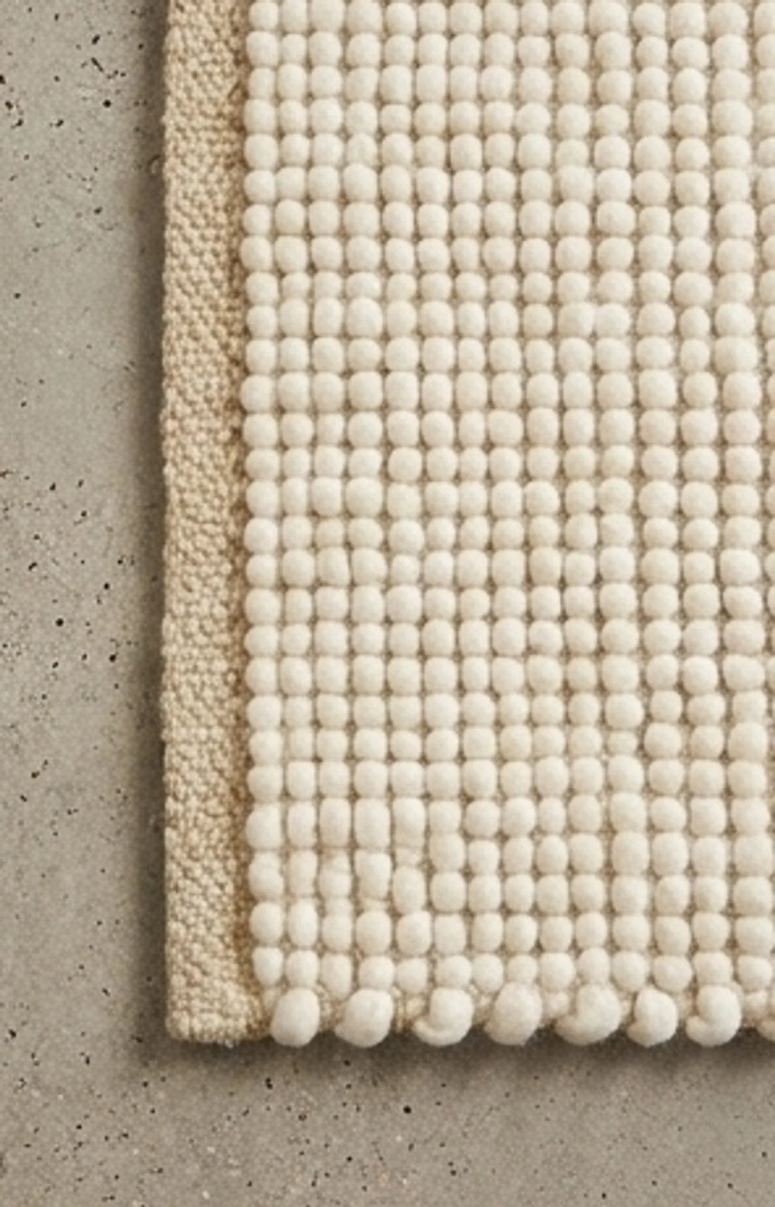 Wool Handwoven Cream Rug — overhead flat-lay on a natural surface