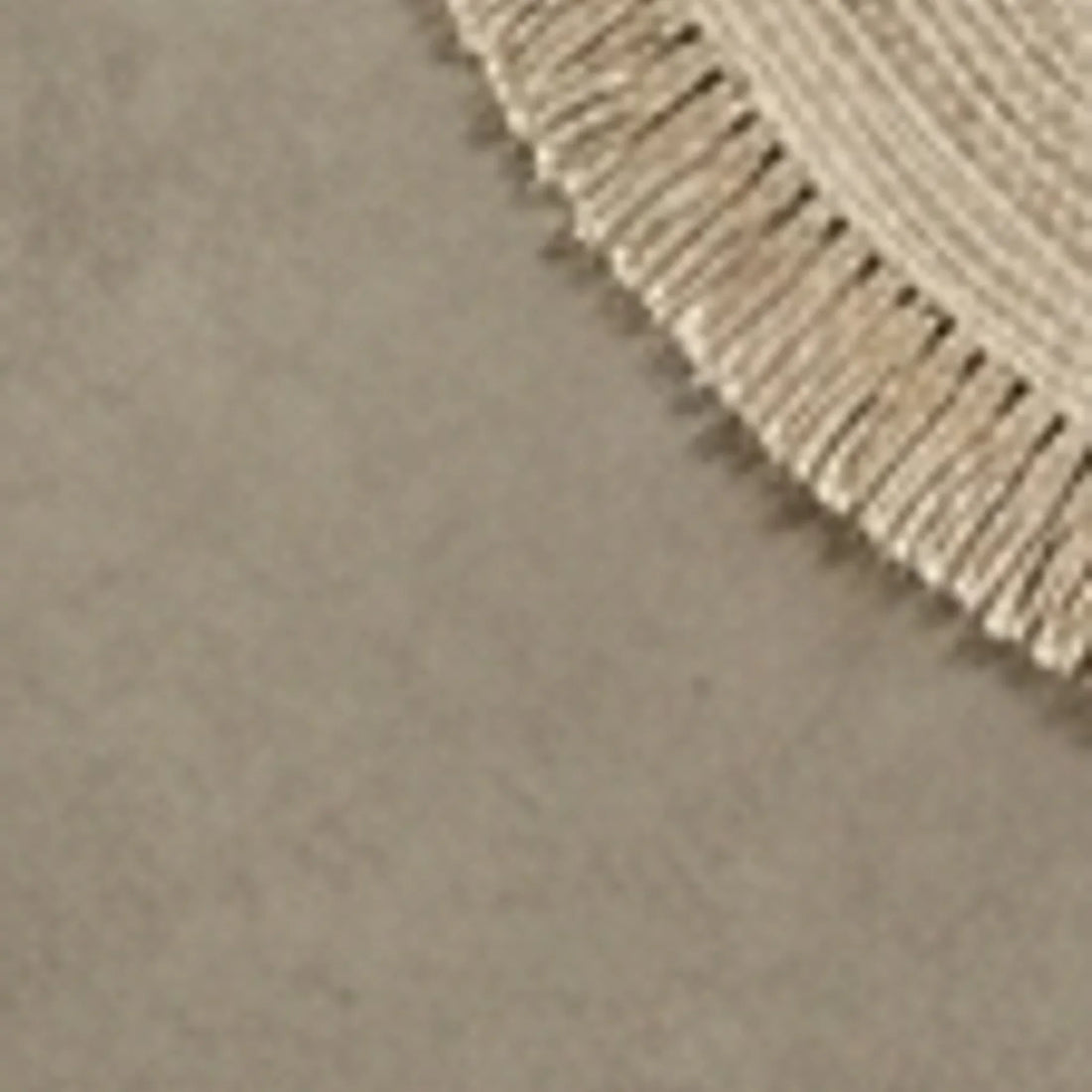 Round Wool Braided Rug — overhead flat-lay on a natural surface