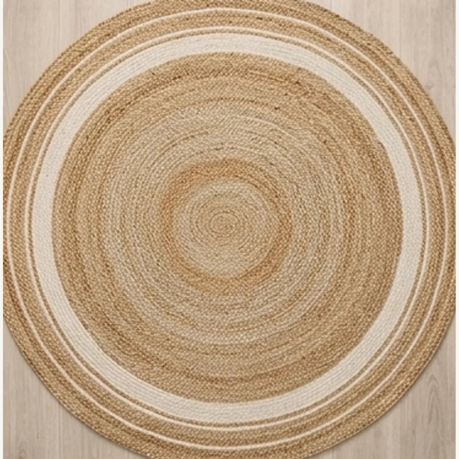 Round Jute Rug — overhead flat-lay on a natural surface