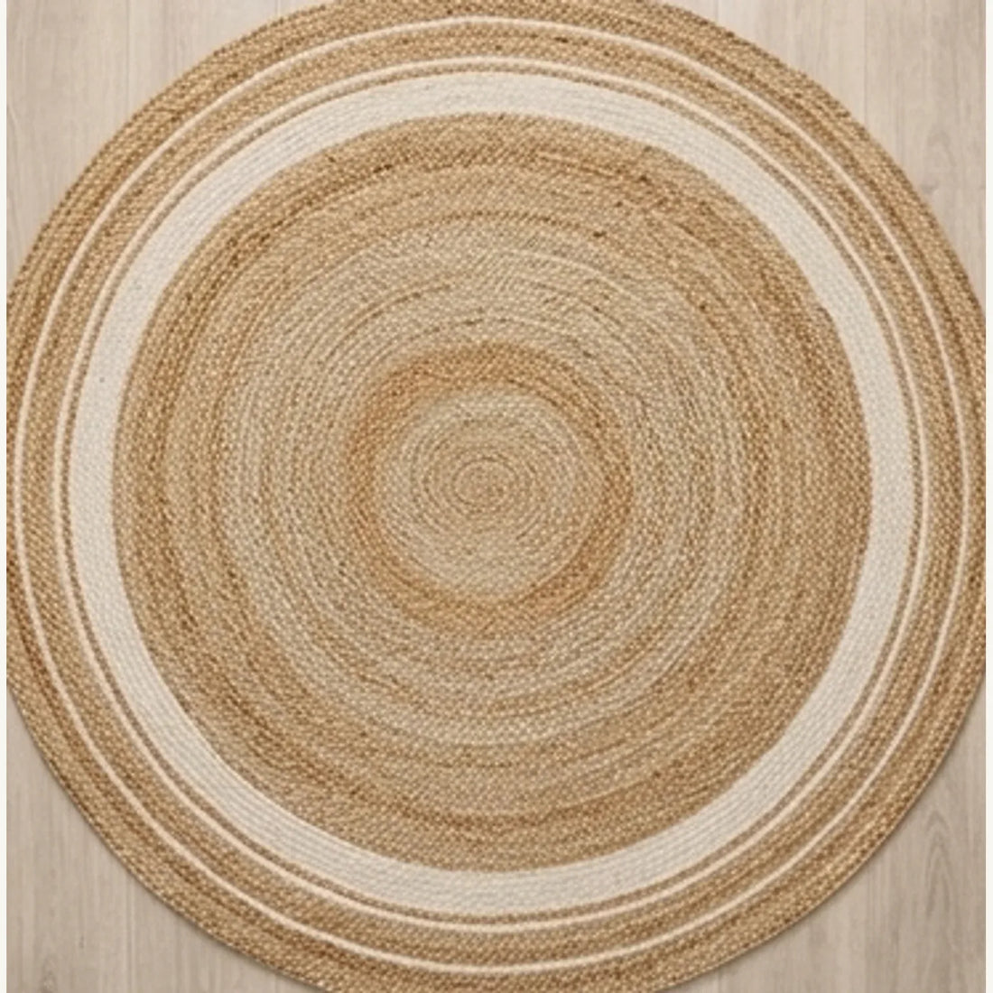 Round Jute Rug — overhead flat-lay on a natural surface