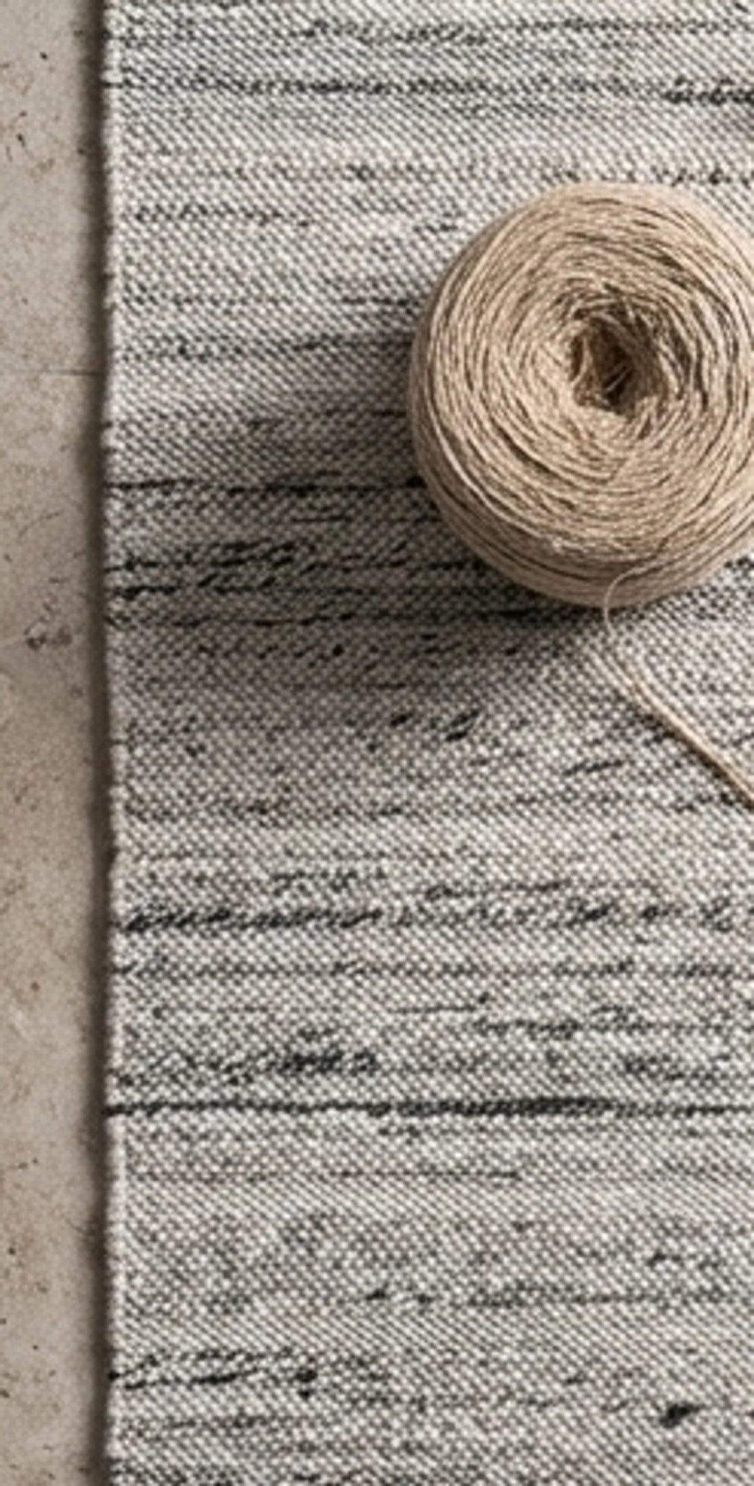 Natural Wool Carpet — overhead flat-lay on a natural surface
