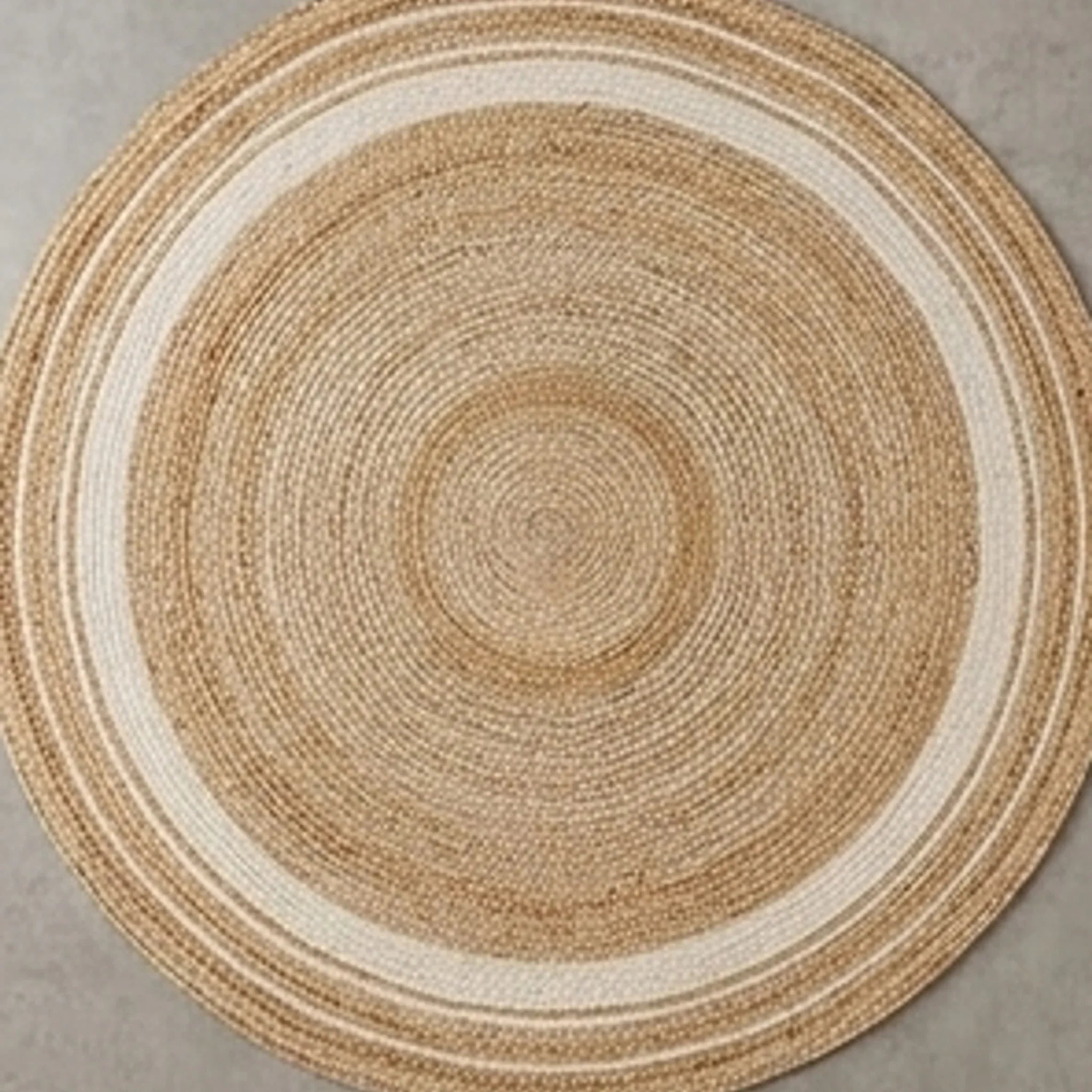 Round Jute Rug — overhead flat-lay on a natural surface