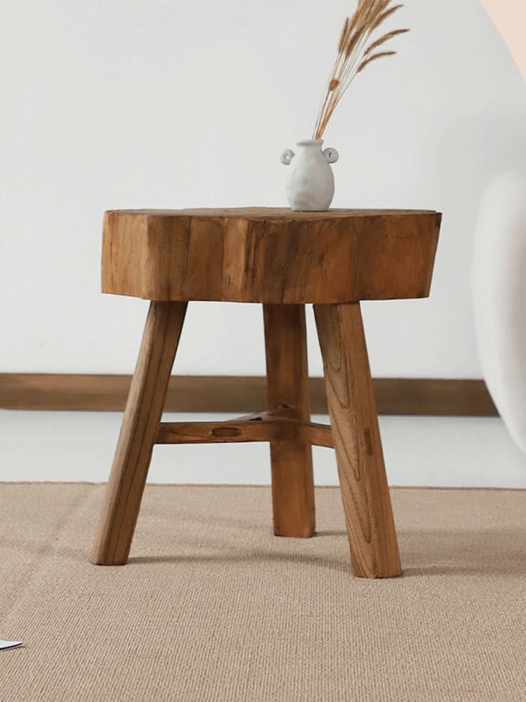 Natural Elm Solid Wood Stool with rustic wood grain and textured legs, home decor accent.