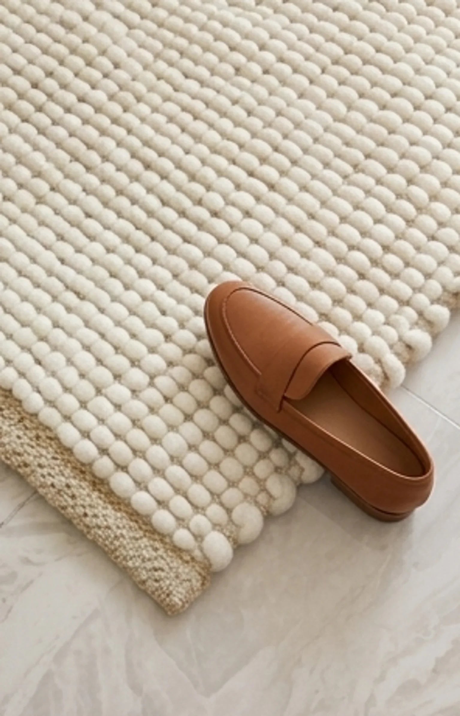 Wool Handwoven Cream Rug — scale reference beside a complementary prop